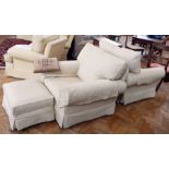 Two cream weave armchairs with a footstool