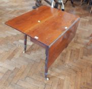 Victorian mahogany drop-leaf dining table on turned supports