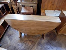 Ercol style elm drop-leaf dining table,