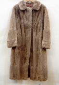 A light brown full-length vintage fur coat with half belt (SS)  Live Bidding: If you would like a