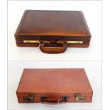 A leather suitcase with brass fittings and a brown leather attache case by Mendoza (2)  Live