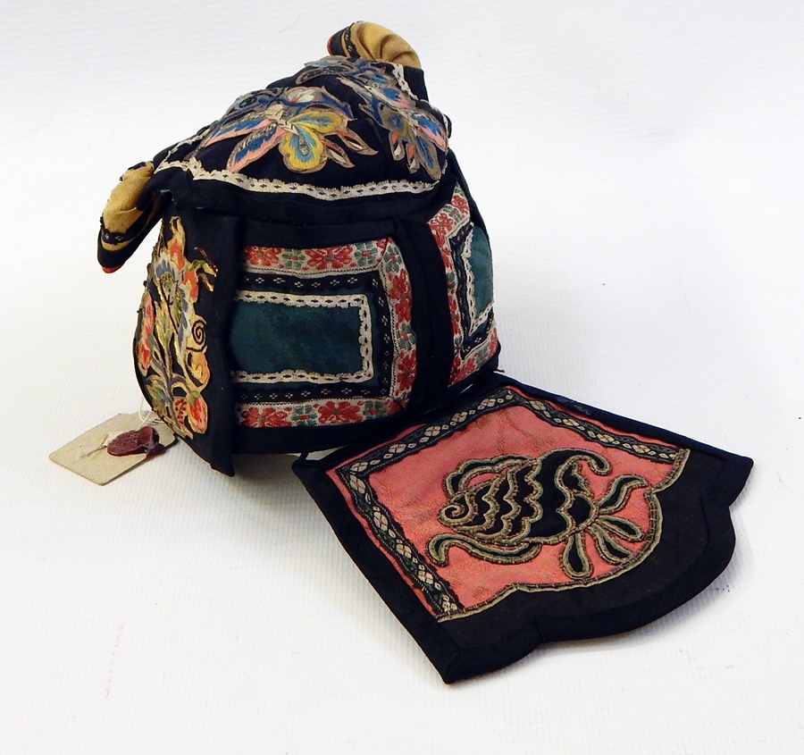 Chinese silk child's hat, embroidered with a cats face bearing a label with sealing wax stamp Live - Image 2 of 2