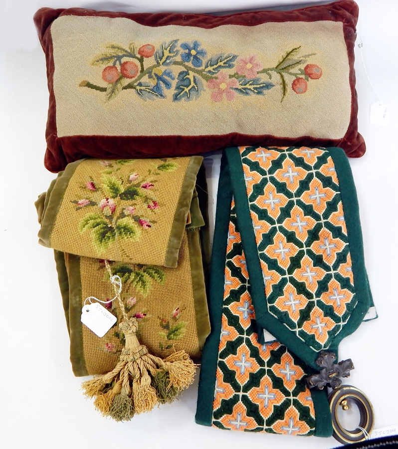 Two tapestry bell-pulls trimmed in green velvet showing roses, two other woolwork bell-pulls with
