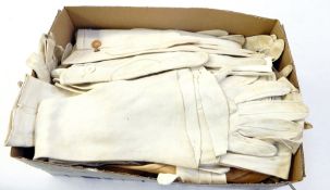 Large collection of cream kid evening gloves and a few in other colours (1 box) Live Bidding: If you