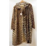 A full-length leopard coat, unlined, possibly gentleman's  Live Bidding: If you would like a