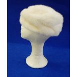 A "Dolores" cream mink hat and another with a pom-pom (2) Live Bidding: If you would like a