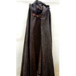 Saint Laurent Rive Gauche heavy woollen cloak, eastern style with hood having tassel and trimmed