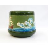 Eichwald majolica pottery jardiniere decorated with sailing galleon and waves, on a green ground,