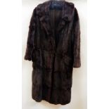 A vintage fur coat, possibly musquash  Live Bidding: If you would like a condition report on this