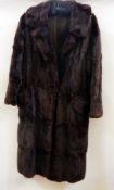 A vintage fur coat, possibly musquash  Live Bidding: If you would like a condition report on this