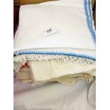 A large quantity of table linen including embroidered, crochet edged, table napkins, tablecloths,