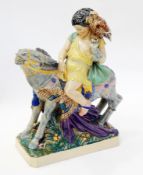 Charles Vyse glazed earthenware group, "The Falconer", boy seated on donkey carrying eagle and