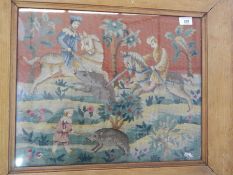 A tapestry showing a hunting scene with mounted horsemen and boar in a landscape, 40cm x 49.5cm,