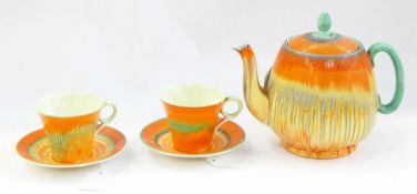 Shelley teaset decorated with orange and green striped bands of running glaze viz:- teapot and two