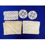 A selection of lace, lace collars and others including tablecloths, table mats, a cobweb christening