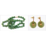 String of jade beads and a pair of gold and jade drop earrings  Live Bidding: If you would like a