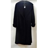 Vintage Persian lamb black coat, shawl collar and full sleeves, labled "T B Dowson, Blackburn"