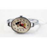 Swiss chrome Mickey Mouse watch with Mickey Mouse figure to the oval dial, hands in form of his arms
