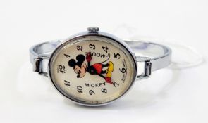 Swiss chrome Mickey Mouse watch with Mickey Mouse figure to the oval dial, hands in form of his arms