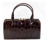 1950's brown crocodile handbag, fixed frame, suede lined interior, labled "The Martin, made in