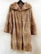 A vintage coat (af) together with a vintage fur jacket and various other vintage fur pieces and