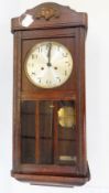 Modern walnut regulator-style wall clock and an oak wall clock (2)