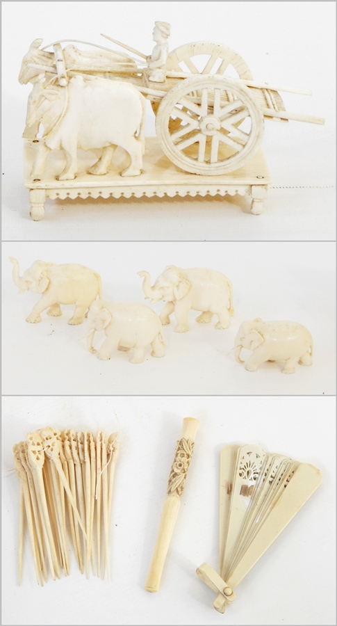 Eastern carved ivory model bullock cart with driver, 12cm wide,