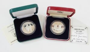 Two Cook Islands proof coinage sets, two Cook Island one dollar commemorative coins,