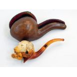 Meerschaum and amber pipe, the bowl carved with hunting dog holding game,