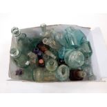 A collection of glass bottles to include Drew & Co,