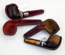 Wooden pipe with silver collar, cased (mouthpiece missing),