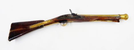 Short brass barrelled blunderbuss with missing hammer, ramrod and brass butt plate 
 Live Bidding: