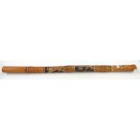 Two didgeridoo decorated in oceanic style