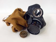 One civilian duty respirator (normal), with haversack and anti-dim outfit,