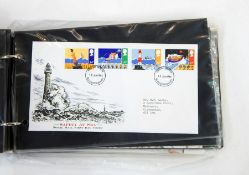 Folder of GB first day covers including one Falklands coin card and one Elvis Presley collection