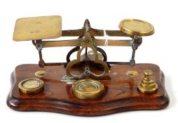 Set 19th century brass gold scales with eight weights,