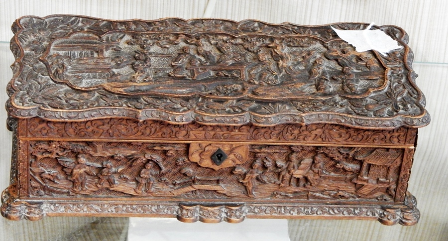 Chinese carved box, rectangular with serpentine sides, carved with scenes of figures,