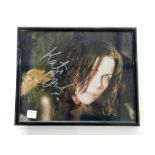 A signed Kate Beckinsale photograph, Peter Pracownik, Ian White with inscription "Ian,