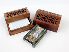 A tarot set in a wooden and pierced box, Legends the Arthurian tarot set in a pierced wooden box,