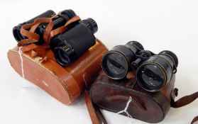 Pair vintage leather and brass field glasses in Callaghan Opticians, New Bond Street,