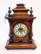 Victorian mahogany mantel clock in architectural-style case with split pilasters and white chapter