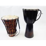 Two small hand drums,