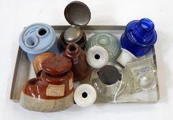 A collection of stoneware and glass ink bottles