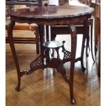 Stained wood coffee table on cabriole legs with basin support to bottom