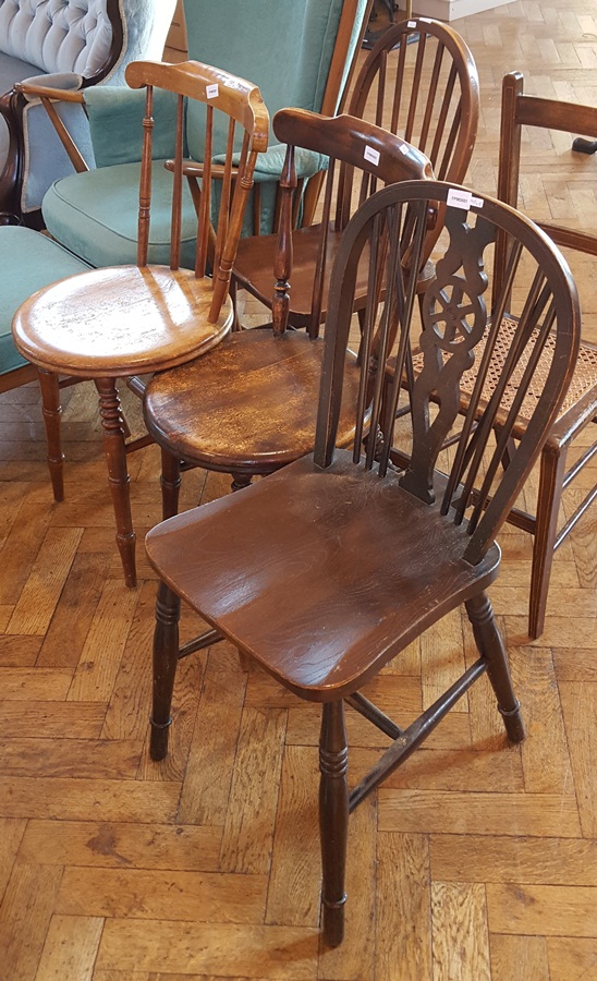 Two Victorian splatback kitchen chairs, circular solid seats on turned legs,