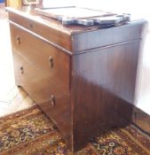 Stained oak chest with two graduating drawers and teardrop handles and oak mirror