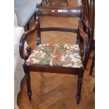 Early 19th century mahogany bar back open armchair with downswept arms, upholstered drop-in seat,