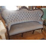 Victorian carved mahogany frame, button-back sofa, dralon upholstery, on cabriole legs and castors,