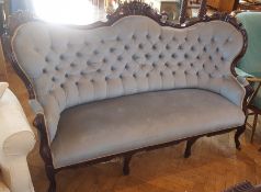 Victorian carved mahogany frame, button-back sofa, dralon upholstery, on cabriole legs and castors,