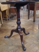 Snap-top circular occasional tripod table on turned and bulbous supports,